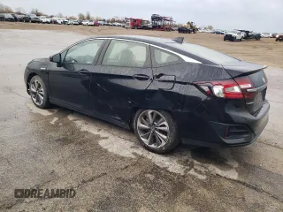 2018 Honda Clarity Plug-In Hybrid with VIN JHMZC5F14JC018446, listed as a Copart auction lot 77164344 with 61,741 mi miles and Salvage Title. Bid and sale history available at carsss.com. Image 2.