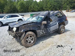 1996 Jeep Grand Cherokee Laredo with VIN 1J4FX58S6TC349590, listed as a Copart auction lot 72278714 with 0 mi miles and Salvage Title. Bid and sale history available at carsss.com. Image 1.