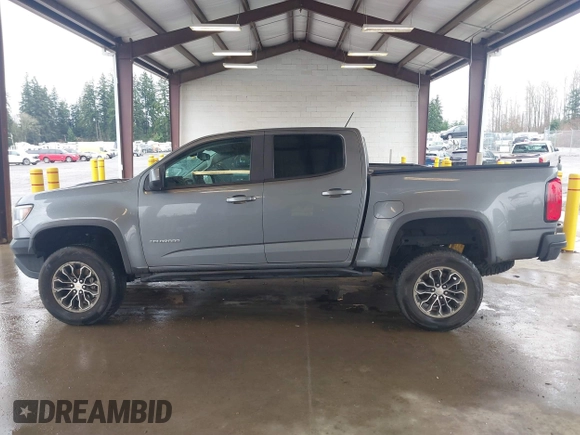 2018 Chevrolet Colorado 4WD ZR2 with VIN 1GCGTEEN9J1325135, listed as a IAAI auction lot 41869769 with 77,327 mi miles. Bid and sale history available at carsss.com. Image 14.