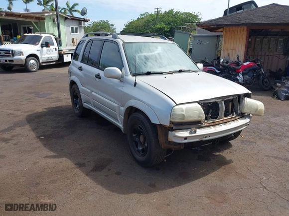 2002 Suzuki Grand Vitara with VIN JS3TE62VX24154173, listed as a IAAI auction lot 41711181 with 224,024 mi miles. Bid and sale history available at carsss.com. Image 1.