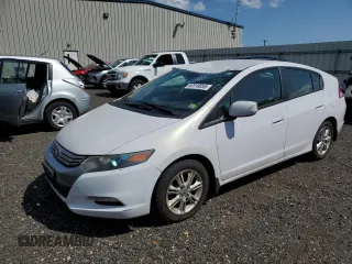 2010 Honda Insight EX with VIN JHMZE2H76AS010185, listed as a Copart auction lot 62018055 with 121,525 mi miles and Salvage title. Bid and sale history available at DreamBid. Image 1.