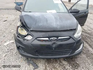 2012 Hyundai Accent SE with VIN KMHCU5AE7CU031523, listed as a IAAI auction lot 41519387 with 196,272 mi miles. Bid and sale history available at carsss.com. Image 6.
