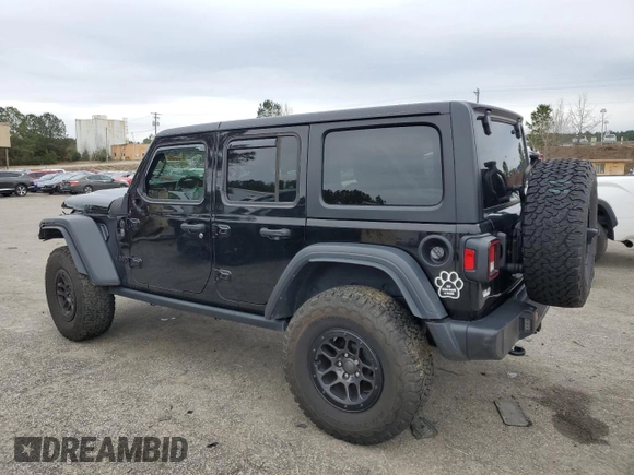 2023 Jeep Wrangler Sport with VIN 1C4HJXDG8PW643414, listed as a Copart auction lot 87768255 with 31,894 mi miles and Salvage Title. Bid and sale history available at DreamBid. Image 2.