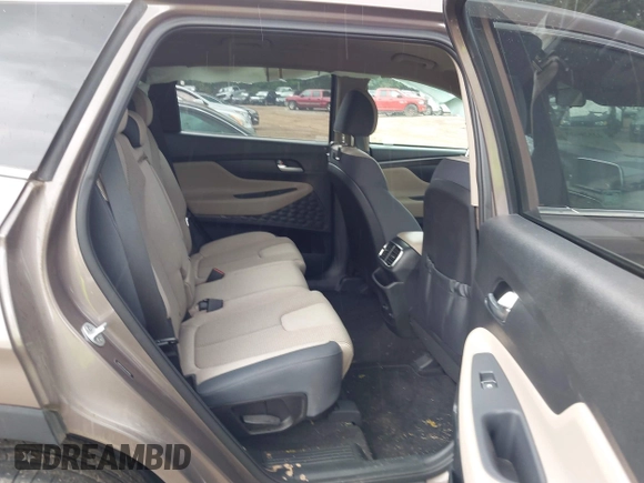 2020 Hyundai Santa Fe SE with VIN 5NMS23AD4LH142202, listed as a IAAI auction lot 42526020 with 59,964 mi miles and . Bid and sale history available at DreamBid. Image 8.