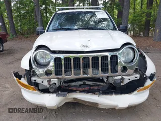 2006 Jeep Liberty Limited with VIN 1J4GL58K06W210025, listed as a IAAI auction lot 42189823 with 211,182 mi miles. Bid and sale history available at carsss.com. Image 6.