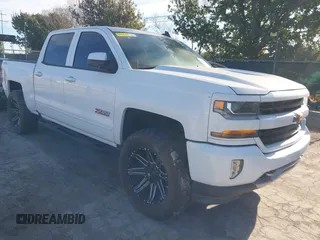 2017 Chevrolet Silverado 1500 LT with VIN 3GCUKREC4HG466329, listed as a IAAI auction lot 41305052 with 57,844 mi miles and . Bid and sale history available at DreamBid. Image 1.