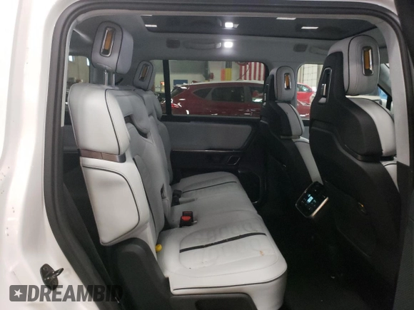 2023 Rivian R1S Adventure with VIN 7PDSGABA8PN014637, listed as a Copart auction lot 46277855 with 20,343 mi miles and Salvage Title. Bid and sale history available at DreamBid. Image 11.