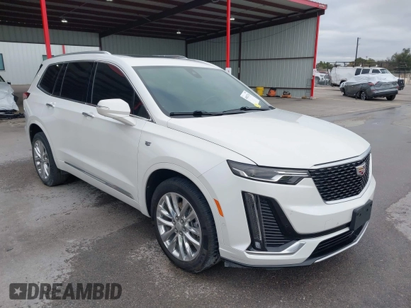 2021 Cadillac XT6 Premium Luxury z VIN 1GYKPCRS8MZ233209, wystawiony jako IAAI lot #40012714 z przebiegiem 45 599 mil mil oraz . Historia ofert i sprzedaży dostępna na DreamBid. Obrazek 1.