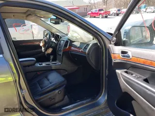 2012 Jeep Grand Cherokee Limited with VIN 1C4RJFBG9CC272826, listed as a IAAI auction lot 41833337 with 108,295 mi miles. Bid and sale history available at carsss.com. Image 5.