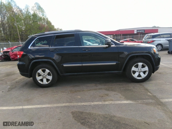 2011 Jeep Grand Cherokee Laredo with VIN 1J4RR4GTXBC538060, listed as a IAAI auction lot 41964694 with 152,999 mi miles. Bid and sale history available at carsss.com. Image 14.
