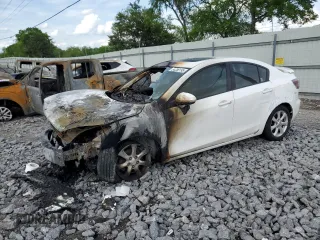 2010 Mazda 3 i Sport with VIN JM1BL1SF6A1102857, listed as a Copart auction lot 54330195 with Not Provided miles and Salvage Title. Bid and sale history available at DreamBid. Image 1.