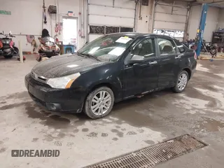 2010 Ford Focus SEL with VIN 1FAHP3HNXAW118514, listed as a IAAI auction lot 41891937 with 118,590 mi miles. Bid and sale history available at carsss.com. Image 2.