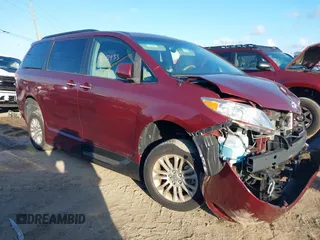 2014 Toyota Sienna XLE z VIN 5TDYK3DCXES473671, wystawiony jako IAAI lot #42243030 z przebiegiem 70 052 mil mil oraz . Historia ofert i sprzedaży dostępna na DreamBid. Obrazek 1.