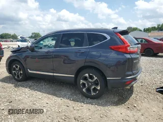 2018 Honda CR-V Touring with VIN 2HKRW2H9XJH605264, listed as a Copart auction lot 61500315 with 106,616 mi miles and Salvage title. Bid and sale history available at DreamBid. Image 2.