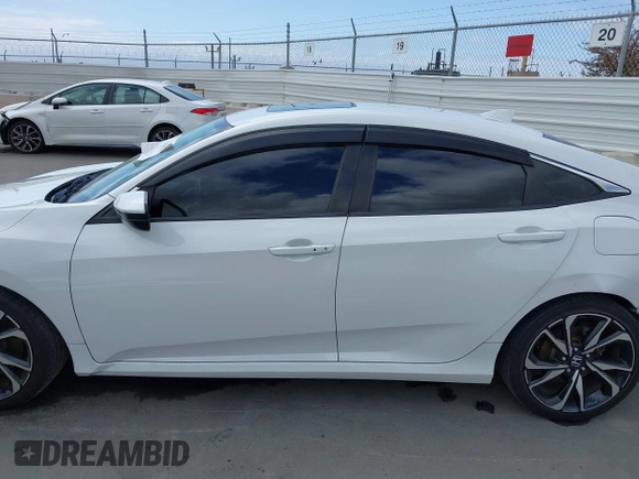 2019 Honda Civic Si z VIN 2HGFC1E58KH707715, wystawiony jako IAAI lot #42108131 z przebiegiem 126 044 mil mil oraz . Historia ofert i sprzedaży dostępna na DreamBid. Obrazek 15.