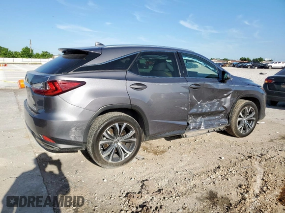 2020 Lexus RX 350 с VIN 2T2HZMDA2LC253085, выставлен на аукционе Copart как лот 57765055 с пробегом 54 939 миль миль и Списание • Salvage title. История ставок и продаж доступна на DreamBid. Изображение 3.