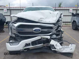 2021 Ford F-150 XL with VIN 1FTFW1E8XMFA69505, listed as a IAAI auction lot 42446323 with 58,214 mi miles and . Bid and sale history available at DreamBid. Image 6.
