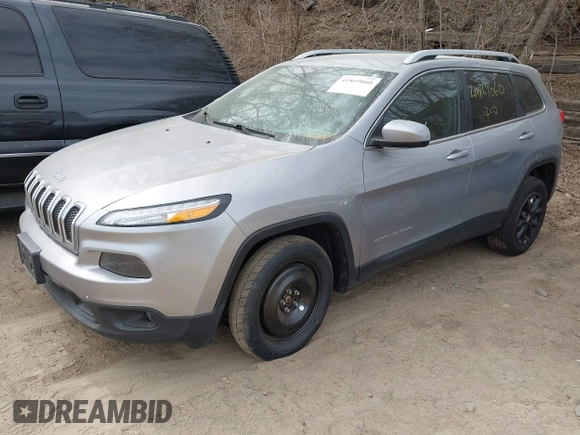 2016 Jeep Cherokee Latitude with VIN 1C4PJMCB7GW252724, listed as a IAAI auction lot 41869060 with 125,119 mi miles. Bid and sale history available at carsss.com. Image 17.