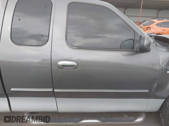 2003 Ford F-150 XL with VIN 1FTRX17W93NB63496, listed as a IAAI auction lot 42406687 with Not provided miles and . Bid and sale history available at DreamBid. Image 12.