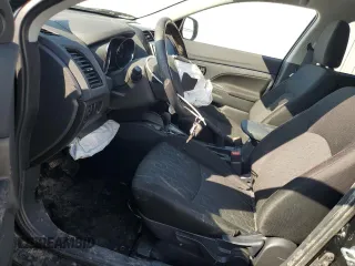 2023 Mitsubishi Outlander ES z VIN JA4ARUAU6PU000245, wystawiony jako Copart lot #56297065 z przebiegiem 34 145 mil mil oraz Szkody całkowita. Historia ofert i sprzedaży dostępna na DreamBid. Obrazek 7.
