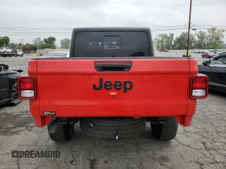 2023 Jeep Gladiator Sport S with VIN 1C6HJTAG4PL547608, listed as a Copart auction lot 52566245 with 8,464 mi miles and Salvage title. Bid and sale history available at DreamBid. Image 6.
