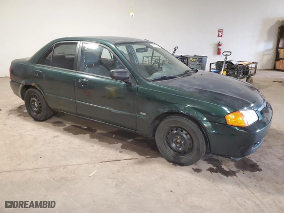 2000 Mazda Protege ES with VIN JM1BJ2216Y0199042, listed as a Copart auction lot 52282505 with 177,868 mi miles and Salvage Title. Bid and sale history available at carsss.com. Image 4.