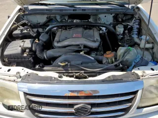 2003 Suzuki XL7 Touring with VIN JS3TY92V334105374, listed as a Copart auction lot 64013375 with 177,939 mi miles and Salvage title. Bid and sale history available at DreamBid. Image 11.