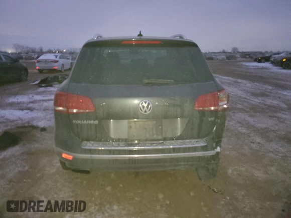 2016 Volkswagen Touareg Sport with VIN WVGEF9BP2GD005296, listed as a Copart auction lot 88808735 with 133,429 mi miles and Salvage Title. Bid and sale history available at DreamBid. Image 6.