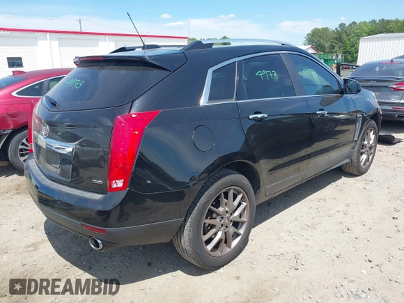 2015 Cadillac SRX Performance Collection with VIN 3GYFNCE30FS549872, listed as a IAAI auction lot 42201529 with 125,128 mi miles and . Bid and sale history available at DreamBid. Image 4.