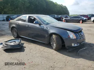 2013 Cadillac CTS Performance z VIN 1G6DK5E3XD0104466, wystawiony jako Copart lot #57479555 z przebiegiem Nie podano mil oraz Szkody całkowita. Historia ofert i sprzedaży dostępna na DreamBid. Obrazek 4.