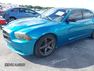2012 Dodge Charger SXT with VIN 2C3CDXHG0CH185859, listed as a IAAI auction lot 40816799 with 132,572 mi miles. Bid and sale history available at carsss.com. Image 6.