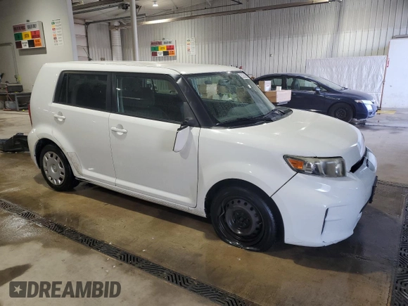 2011 Scion xB z VIN JTLZE4FE6B1125993, wystawiony jako Copart lot #53336335 z przebiegiem 229 378 mil mil oraz Szkoda całkowita • Salvage title. Historia ofert i sprzedaży dostępna na DreamBid. Obrazek 4.