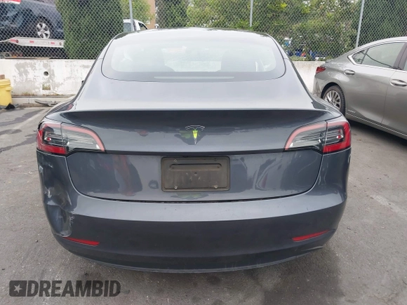 2023 Tesla Model 3 with VIN 5YJ3E1EA4PF705949, listed as a IAAI auction lot 42336682 with 88,056 mi miles and . Bid and sale history available at DreamBid. Image 16.