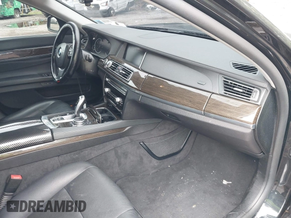2015 BMW 7 Series 740Li xDrive with VIN WBAYF4C55FG291723, listed as a IAAI auction lot 42694382 with 101,140 mi miles and . Bid and sale history available at DreamBid. Image 5.