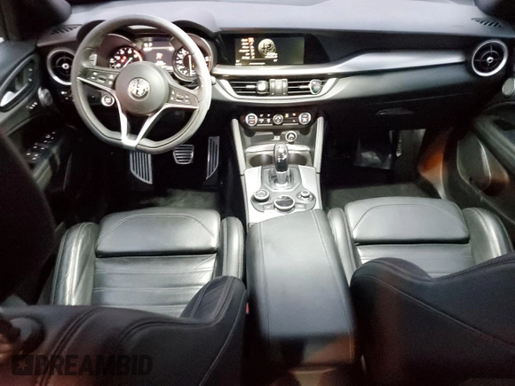 2019 Alfa Romeo Stelvio Ti Lusso z VIN ZASPAKBN8K7C30855, wystawiony jako Copart lot #85011394 z przebiegiem 65 100 mil mil oraz Szkoda całkowita • Salvage title. Historia ofert i sprzedaży dostępna na DreamBid. Obrazek 8.