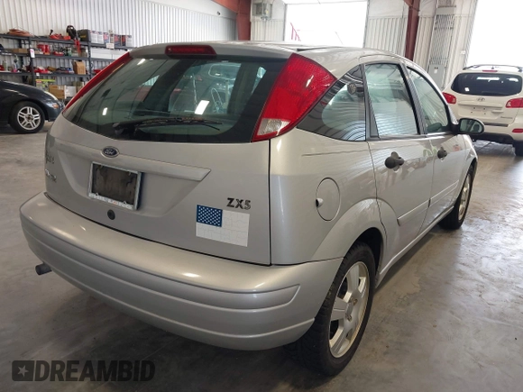 2004 Ford Focus ZX5 with VIN 3FAHP37314R110616, listed as a IAAI auction lot 42581804 with 94,252 mi miles and . Bid and sale history available at DreamBid. Image 4.