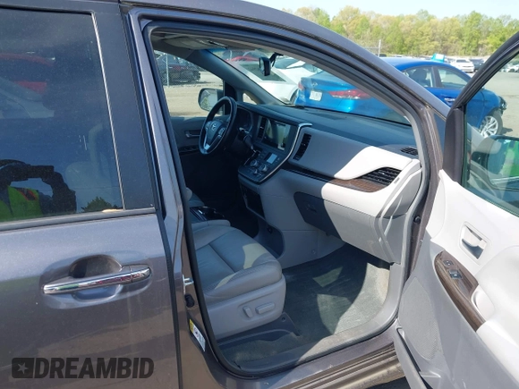 2015 Toyota Sienna XLE with VIN 5TDYK3DC9FS685768, listed as a IAAI auction lot 42062942 with 132,242 mi miles. Bid and sale history available at carsss.com. Image 5.