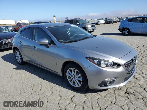 2015 Mazda 3 i Grand Touring z VIN JM1BM1M70F1260802, wystawiony jako Copart lot #60662705 z przebiegiem 89 974 mil mil oraz Szkoda całkowita • Salvage title. Historia ofert i sprzedaży dostępna na DreamBid. Obrazek 4.