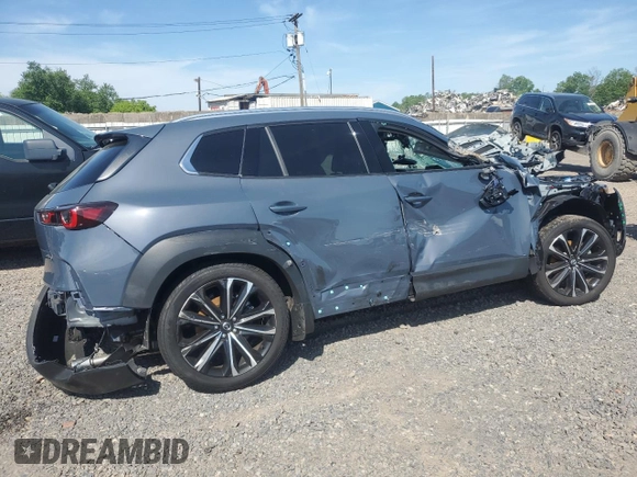 2025 Mazda CX-50 S Premium Plus with VIN 7MMVABEM1SN319228, listed as a Copart auction lot 55958135 with 4,133 mi miles and Salvage title. Bid and sale history available at DreamBid. Image 3.