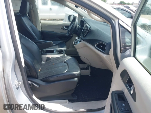 2023 Chrysler Pacifica Touring L with VIN 2C4RC1BG7PR521232, listed as a IAAI auction lot 42087909 with 34,609 mi miles and . Bid and sale history available at DreamBid. Image 5.