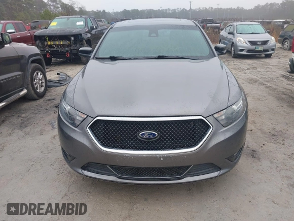 2014 Ford Taurus SHO with VIN 1FAHP2KT0EG171336, listed as a IAAI auction lot 41566688 with 154,328 mi miles. Bid and sale history available at carsss.com. Image 6.