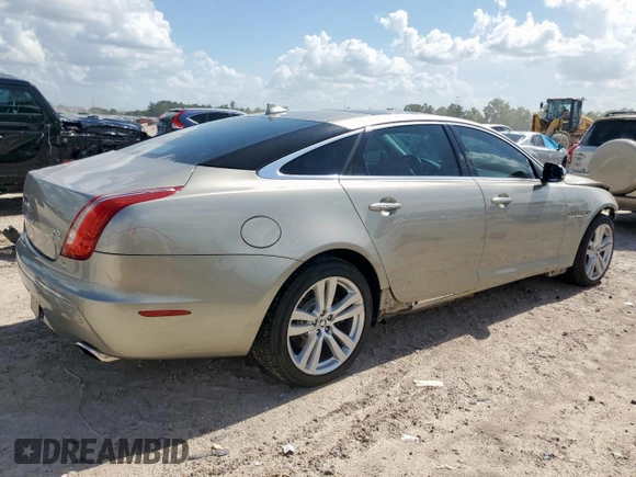2013 Jaguar XJ Portfolio with VIN SAJWJ2GD5D8V49505, listed as a Copart auction lot 61171955 with 129,158 mi miles and Salvage title. Bid and sale history available at DreamBid. Image 3.