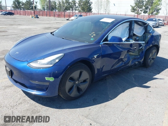 2020 Tesla Model 3 Standard Range Plus with VIN 5YJ3E1EA1LF590396, listed as a IAAI auction lot 41868089 with 51,278 mi miles. Bid and sale history available at carsss.com. Image 19.