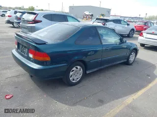 1997 Honda Civic EX with VIN 1HGEJ8249VL102194, listed as a IAAI auction lot 42077905 with 155,339 mi miles. Bid and sale history available at carsss.com. Image 4.