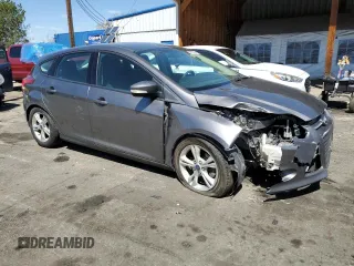 2014 Ford Focus SE with VIN 1FADP3K26EL293900, listed as a Copart auction lot 52888495 with 123,709 mi miles and Salvage Title. Bid and sale history available at carsss.com. Image 4.