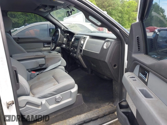2014 Ford F-150 XL with VIN 1FTFX1CT5EKD34067, listed as a IAAI auction lot 42290888 with 214,507 mi miles and . Bid and sale history available at DreamBid. Image 5.