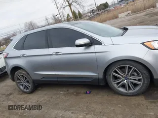 2021 Ford Edge Titanium z VIN 2FMPK4K94MBA32297, wystawiony jako IAAI lot #41834740 z przebiegiem 45 908 mil mil oraz . Historia ofert i sprzedaży dostępna na DreamBid. Obrazek 13.
