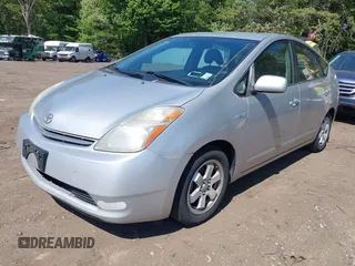 2006 Toyota Prius z VIN JTDKB20U667543175, wystawiony jako IAAI lot #42313159 z przebiegiem 277 637 mil mil oraz . Historia ofert i sprzedaży dostępna na DreamBid. Obrazek 2.