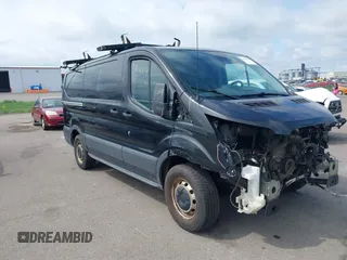 2015 Ford Transit Cargo with VIN 1FTYE1YM9FKA27910, listed as a IAAI auction lot 39414304 with 156,451 mi miles and . Bid and sale history available at DreamBid. Image 1.