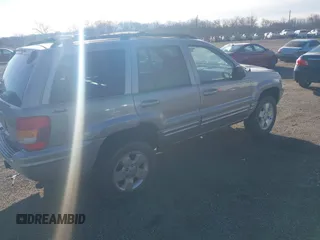 2001 Jeep Grand Cherokee Limited with VIN 1J4GW58N11C650606, listed as a IAAI auction lot 41722256 with 1 mi miles. Bid and sale history available at carsss.com. Image 4.